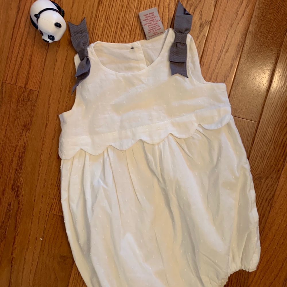 NWOT. CREAM COLORED ROMPER!  18 months! Never worn